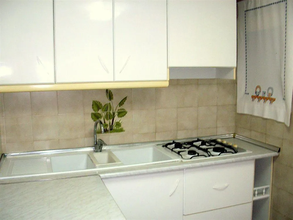 호텔 Apartamentos Triton 칼라 라트자다
